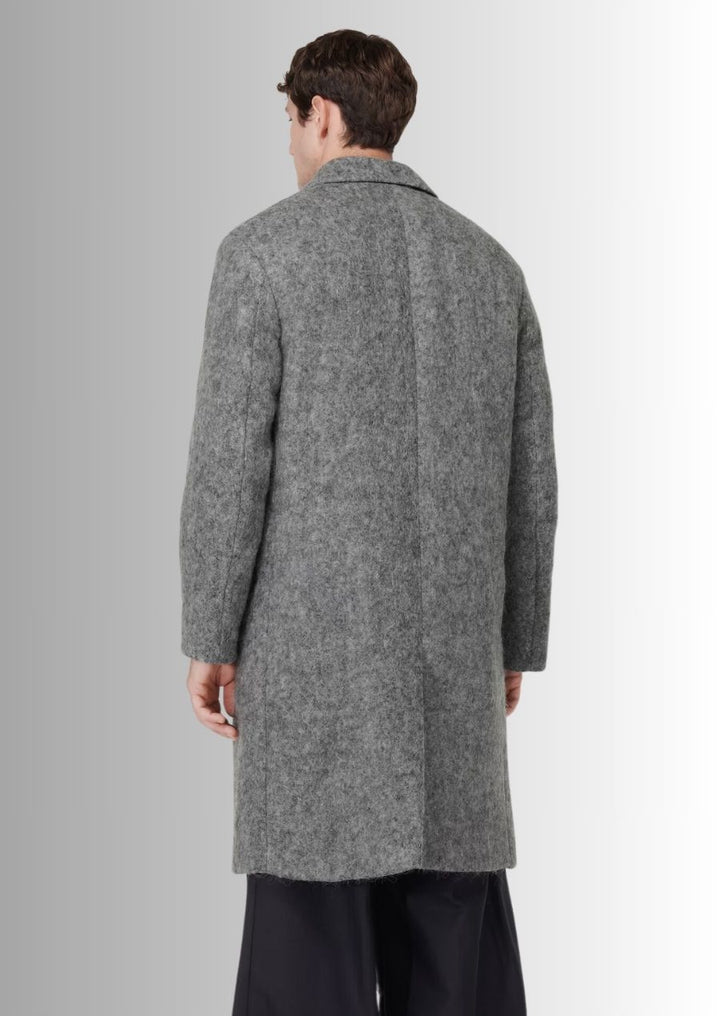 Adoptez l’élégance avec ce manteau en laine gris au style moderne