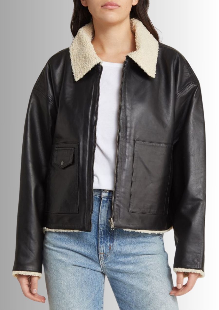 Une veste luxueuse combinant cuir authentique et doublure en peau de mouton pour un confort ultime.