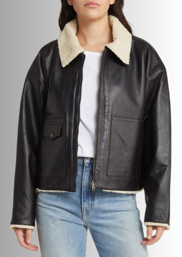 Une veste luxueuse combinant cuir authentique et doublure en peau de mouton pour un confort ultime.